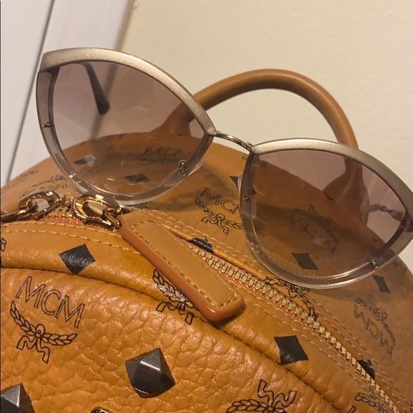 Prada Accessories - Women’s authentic Prada sunglasses